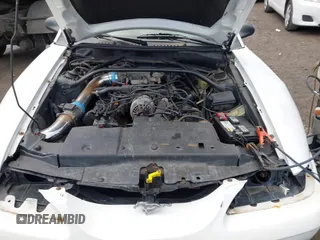 1996 Ford Mustang GT with VIN 1FALP45X7TF201553, listed as a IAAI auction lot 41487690 with 102,015 mi miles. Bid and sale history available at carsss.com. Image 10.
