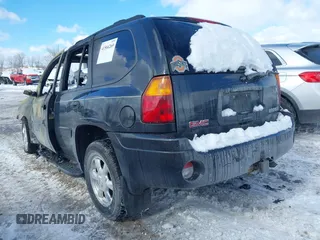 2004 GMC Envoy SLE with VIN 1GKDT13S242426816, listed as a IAAI auction lot 41566269 with 1 mi miles. Bid and sale history available at carsss.com. Image 3.
