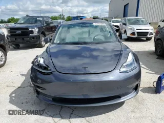 2023 Tesla Model 3 z VIN 5YJ3E1EA0PF677471, wystawiony jako Copart lot #57661625 z przebiegiem 20 326 mil mil oraz Szkoda całkowita • Salvage title. Historia ofert i sprzedaży dostępna na DreamBid. Obrazek 5.