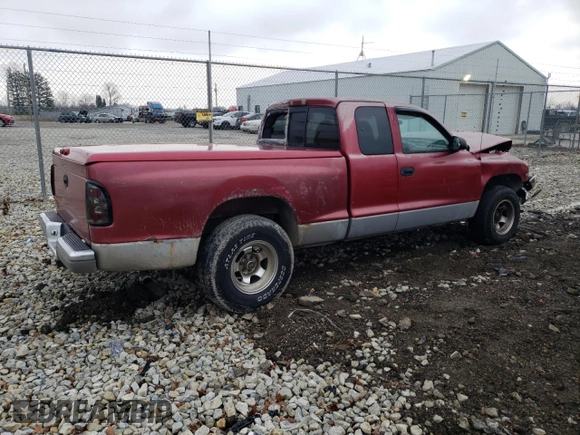 1999 Dodge Dakota SLT with VIN 1B7GL22X0XS268203, listed as a Copart auction lot 85155594 with 185,142 mi miles and Salvage Title. Bid and sale history available at carsss.com. Image 3.