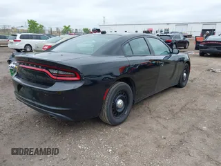 2019 Dodge Charger Police with VIN 2C3CDXKT8KH515011, listed as a IAAI auction lot 42184955 with 110,386 mi miles and . Bid and sale history available at DreamBid. Image 4.