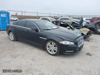 2015 Jaguar XJ with VIN SAJWJ2GD0F8V85914, listed as a IAAI auction lot 41615059 with 115,462 mi miles. Bid and sale history available at carsss.com. Image 1.