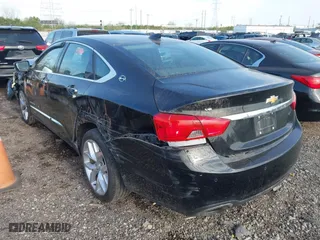 2018 Chevrolet Impala Premier with VIN 2G1125S35J9121674, listed as a IAAI auction lot 42062172 with 149,034 mi miles. Bid and sale history available at carsss.com. Image 3.