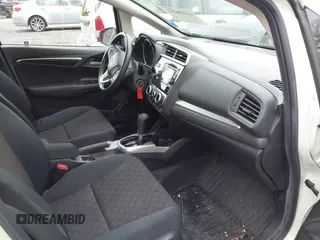 2017 Honda Fit LX with VIN JHMGK5H58HS021117, listed as a IAAI auction lot 42026243 with 94,953 mi miles. Bid and sale history available at carsss.com. Image 5.