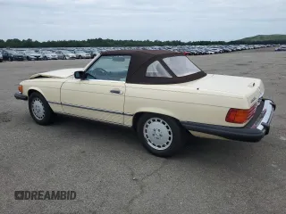1989 Mercedes-Benz 560 with VIN WDBBA48D9KA102252, listed as a Copart auction lot 61684484 with 111,537 mi miles and Salvage Title. Bid and sale history available at carsss.com. Image 2.