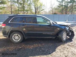 2018 Jeep Grand Cherokee Laredo E with VIN 1C4RJFAG4JC326631, listed as a IAAI auction lot 41191061 with 115,451 mi miles. Bid and sale history available at carsss.com. Image 13.