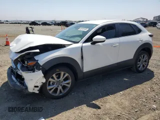 2021 Mazda CX-30 Select с VIN 3MVDMABL0MM218802, выставлен на аукционе Copart как лот 59769135 с пробегом 49 378 миль миль и Списание • Salvage title. История ставок и продаж доступна на DreamBid. Изображение 1.