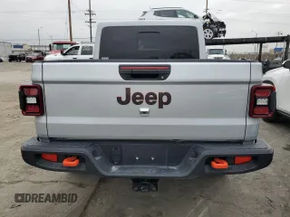 2023 Jeep Gladiator Mojave z VIN 1C6JJTEG9PL587727, wystawiony jako Copart lot #66034185 z przebiegiem 28 776 mil mil oraz Szkoda całkowita • Salvage title. Historia ofert i sprzedaży dostępna na DreamBid. Obrazek 6.