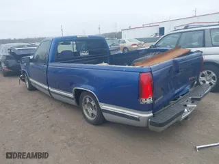 1997 GMC New Sierra 1500 SLE with VIN 1GTEC14W6VZ503469, listed as a IAAI auction lot 41798168 with 232,567 mi miles. Bid and sale history available at carsss.com. Image 3.
