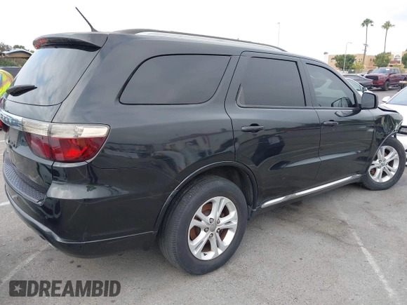2012 Dodge Durango Crew with VIN 1C4SDHDT0CC321037, listed as a IAAI auction lot 42793232 with 162,593 mi miles and . Bid and sale history available at DreamBid. Image 4.