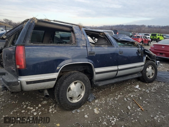1996 GMC Yukon with VIN 1GKEK13R2TJ718801, listed as a Copart auction lot 84489744 with Not Provided miles and Salvage Title. Bid and sale history available at DreamBid. Image 3.