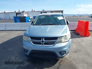 2013 Dodge Journey SXT with VIN 3C4PDCBG4DT584135, listed as a IAAI auction lot 41902149 with 165,700 mi miles and . Bid and sale history available at carsss.com. Image 6.