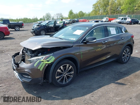 2018 Infiniti QX30 Premium z VIN SJKCH5CR0JA051889, wystawiony jako IAAI lot #42234392 z przebiegiem 104 095 mil mil oraz . Historia ofert i sprzedaży dostępna na DreamBid. Obrazek 2.