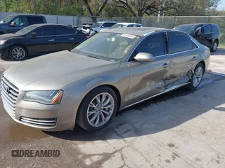 2012 Audi A8 z VIN WAURVAFD3CN024063, wystawiony jako IAAI lot #41706508 z przebiegiem Nie podano mil oraz . Historia ofert i sprzedaży dostępna na DreamBid. Obrazek 2.