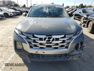 2022 Hyundai Santa Cruz SEL z VIN 5NTJBDAE2NH015174, wystawiony jako Copart lot #56071745 z przebiegiem 19 407 mil mil oraz Szkody całkowita. Historia ofert i sprzedaży dostępna na DreamBid. Obrazek 5.