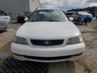 1999 Acura CL z VIN 19UYA325XXL009809, wystawiony jako Copart lot #73392444 z przebiegiem 79 668 mil mil oraz Szkody całkowita. Historia ofert i sprzedaży dostępna na DreamBid. Obrazek 5.