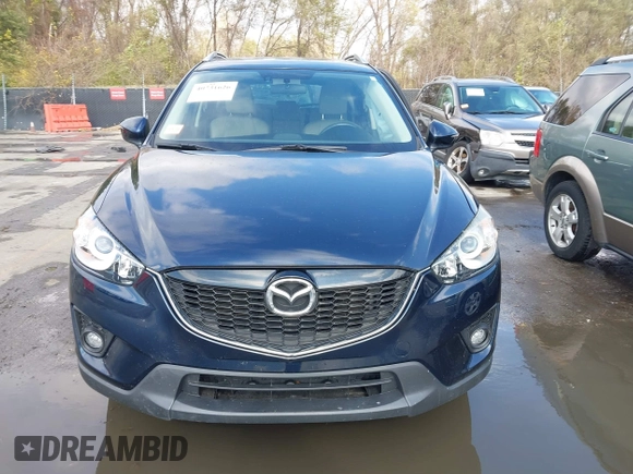 2015 Mazda CX-5 Grand Touring with VIN JM3KE4DY7F0478823, listed as a IAAI auction lot 40731626 with 82,884 mi miles. Bid and sale history available at carsss.com. Image 12.
