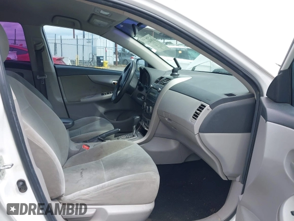 2011 Toyota Corolla L with VIN 2T1BU4EE6BC638383, listed as a IAAI auction lot 41934082 with 130,889 mi miles. Bid and sale history available at carsss.com. Image 5.