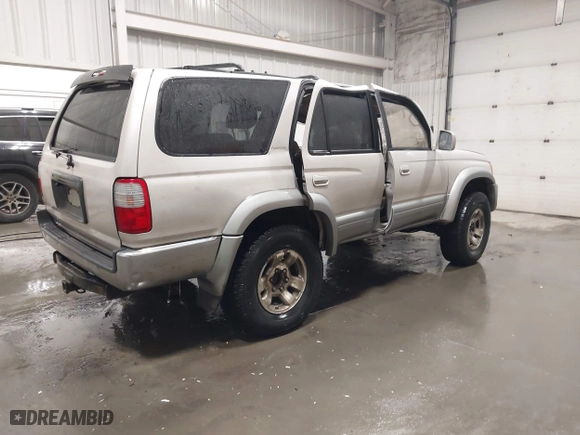 1998 Toyota 4Runner Limited with VIN JT3HN87R0W0189219, listed as a IAAI auction lot 41815288 with 227,784 mi miles. Bid and sale history available at carsss.com. Image 4.