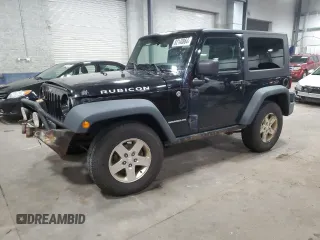 2009 Jeep Wrangler Rubicon with VIN 1J4GA64159L770895, listed as a Copart auction lot 82140864 with 209,464 mi miles and Salvage Title. Bid and sale history available at DreamBid. Image 1.