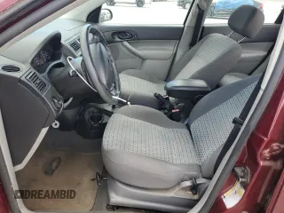 2006 Ford Focus S z VIN 1FAFP34N36W171785, wystawiony jako Copart lot #55815195 z przebiegiem 164 074 mil mil oraz Szkoda całkowita • Salvage title. Historia ofert i sprzedaży dostępna na DreamBid. Obrazek 7.