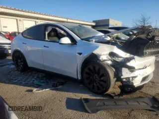 2022 Tesla Model Y Performance with VIN 7SAYGDEFXNF381791, listed as a Copart auction lot 88215705 with 60,153 mi miles and Salvage title. Bid and sale history available at DreamBid. Image 4.