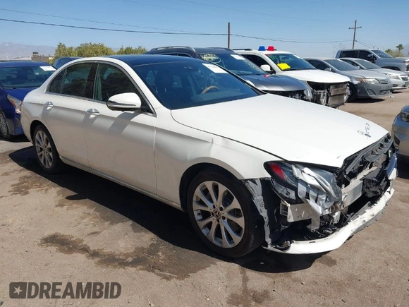 2019 Mercedes-Benz E-Class E 300 with VIN WDDZF4JBXKA597397, listed as a IAAI auction lot 41724672 with 99,258 mi miles. Bid and sale history available at carsss.com. Image 1.