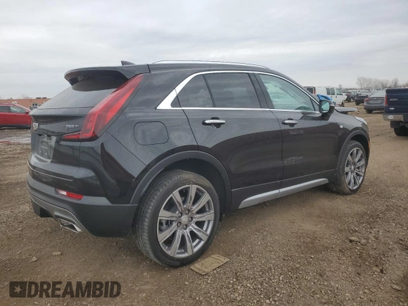 2022 Cadillac XT4 AWD Premium Luxury with VIN 1GYFZDR43NF132553, listed as a Copart auction lot 50869955 with 25,412 mi miles and Salvage title. Bid and sale history available at DreamBid. Image 3.