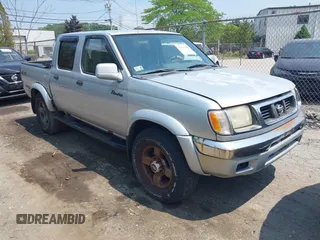 2000 Nissan Frontier XE z VIN 1N6ED27Y3YC354331, wystawiony jako IAAI lot #42437440 z przebiegiem 250 413 mil mil oraz . Historia ofert i sprzedaży dostępna na DreamBid. Obrazek 1.