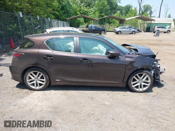 2015 Lexus CT 200h with VIN JTHKD5BH2F2238568, listed as a IAAI auction lot 42429699 with 146,825 mi miles and . Bid and sale history available at DreamBid. Image 14.