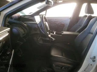 2023 Toyota bZ4X XLE with VIN JTMAAAAA7PA009698, listed as a Copart auction lot 47975935 with 15,916 mi miles and Salvage Title. Bid and sale history available at DreamBid. Image 7.