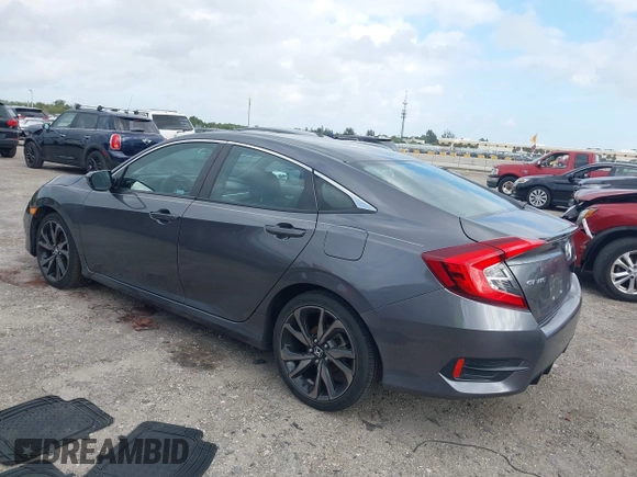 2019 Honda Civic Sport with VIN 2HGFC2F89KH563333, listed as a IAAI auction lot 41959217 with 66,068 mi miles and . Bid and sale history available at DreamBid. Image 3.