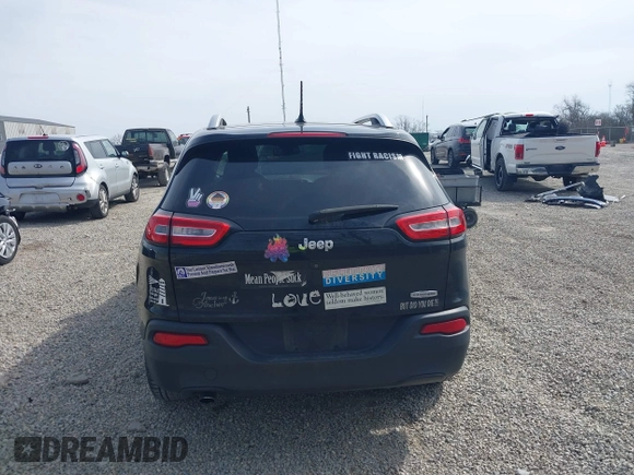 2015 Jeep Cherokee Latitude with VIN 1C4PJLCB3FW517843, listed as a IAAI auction lot 41828715 with 146,862 mi miles and . Bid and sale history available at DreamBid. Image 17.