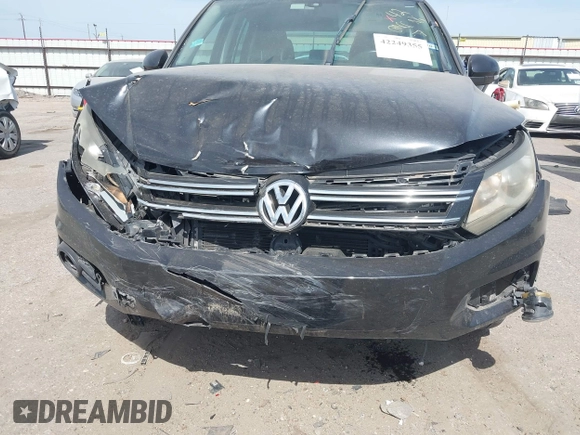 2012 Volkswagen Tiguan SE with VIN WVGAV7AX6CW521960, listed as a IAAI auction lot 42249355 with 118,496 mi miles and . Bid and sale history available at DreamBid. Image 12.