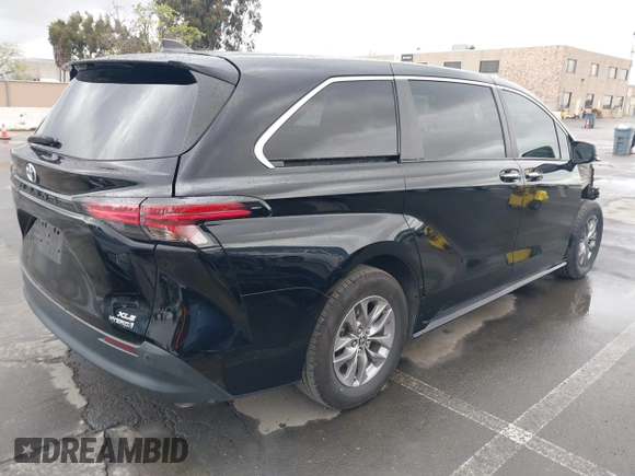 2022 Toyota Sienna XLE with VIN 5TDYRKEC8NS126392, listed as a IAAI auction lot 41912544 with 120,801 mi miles and . Bid and sale history available at DreamBid. Image 4.