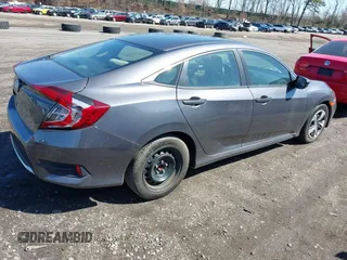 2019 Honda Civic LX with VIN 2HGFC2F66KH547041, listed as a IAAI auction lot 41984140 with 90,123 mi miles and . Bid and sale history available at DreamBid. Image 4.