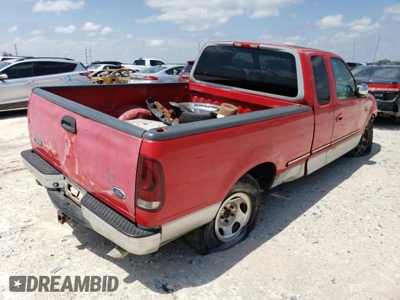 1998 Ford F-150 with VIN 1FTZX1761WKA53404, listed as a Copart auction lot 80628524 with 253,399 mi miles and Salvage title. Bid and sale history available at DreamBid. Image 3.