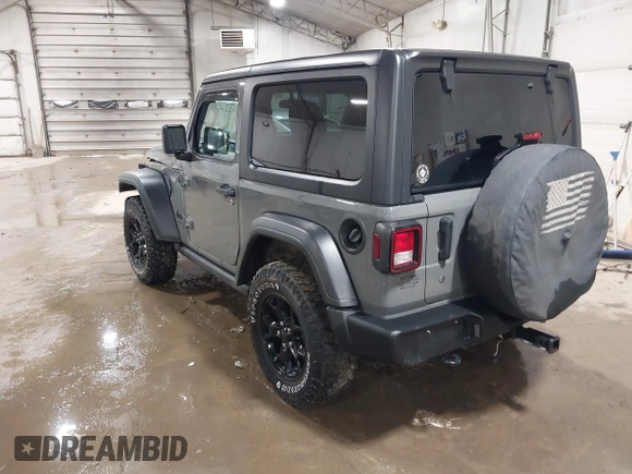 2021 Jeep Wrangler Sport S with VIN 1C4GJXAN7MW647786, listed as a IAAI auction lot 41685775 with 31,907 mi miles and . Bid and sale history available at DreamBid. Image 3.