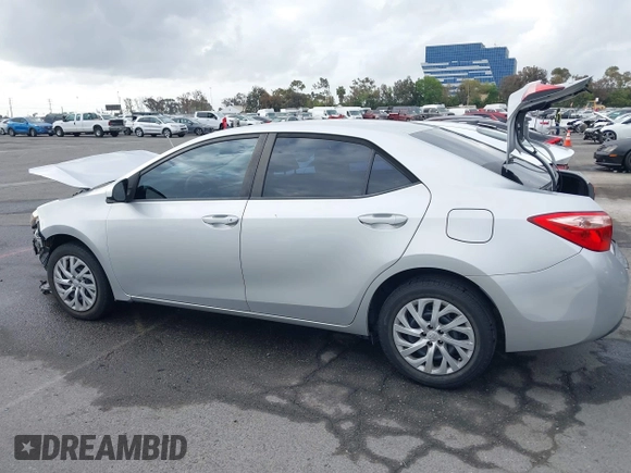 2019 Toyota Corolla L with VIN 5YFBURHE4KP929909, listed as a IAAI auction lot 42078797 with 131,741 mi miles. Bid and sale history available at carsss.com. Image 15.
