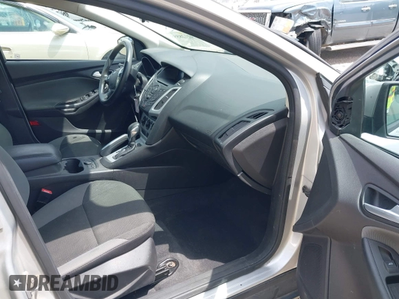 2014 Ford Focus SE with VIN 1FADP3F28EL162669, listed as a IAAI auction lot 42128555 with 104,265 mi miles and . Bid and sale history available at carsss.com. Image 5.