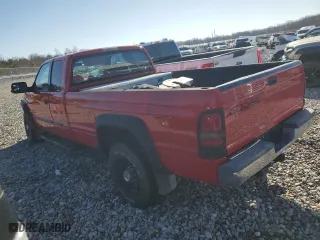 2001 Dodge Ram 2500 with VIN 1B7KC236X1J603433, listed as a Copart auction lot 86824874 with 204,906 mi miles and Salvage Title. Bid and sale history available at carsss.com. Image 2.