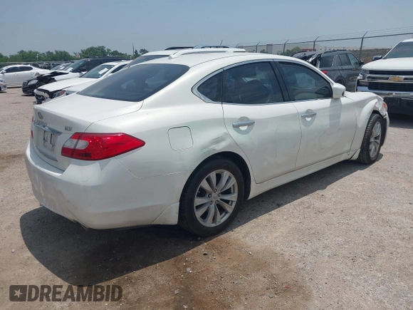 2011 Infiniti M with VIN JN1BY1AP5BM323980, listed as a IAAI auction lot 42293425 with 112,139 mi miles and . Bid and sale history available at DreamBid. Image 4.