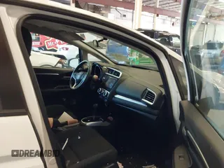 2015 Honda Fit LX with VIN 3HGGK5H57FM106670, listed as a IAAI auction lot 42097655 with 116,303 mi miles and . Bid and sale history available at DreamBid. Image 5.
