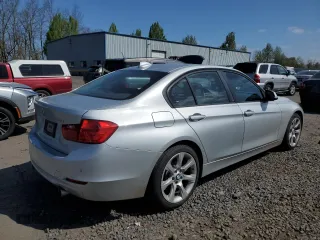 2014 BMW 3 Series 335i xDrive with VIN WBA3B9C56EP458673, listed as a Copart auction lot 52934245 with 37,852 mi miles and Salvage title. Bid and sale history available at DreamBid. Image 3.