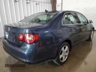 2009 Volkswagen Jetta SE z VIN 3VWRZ71K29M167800, wystawiony jako Copart lot #61451305 z przebiegiem 161 617 mil mil oraz Szkoda całkowita • Salvage title. Historia ofert i sprzedaży dostępna na DreamBid. Obrazek 3.