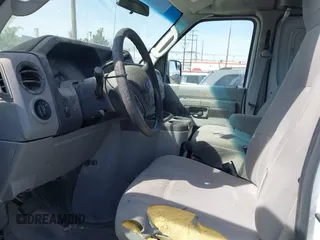 2012 Ford Econoline Cargo Commercial with VIN 1FTNE1EW2CDB17070, listed as a IAAI auction lot 41847884 with 249,165 mi miles and . Bid and sale history available at carsss.com. Image 5.
