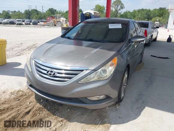 2014 Hyundai Sonata SE with VIN 5NPEC4AC4EH908832, listed as a IAAI auction lot 42099613 with 136,486 mi miles and . Bid and sale history available at DreamBid. Image 2.