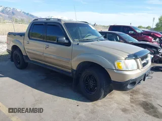 2001 Ford Explorer Sport Trac z VIN 1FMZU77E41UA58737, wystawiony jako IAAI lot #42099243 z przebiegiem 203 593 mil mil oraz . Historia ofert i sprzedaży dostępna na DreamBid. Obrazek 1.