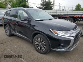 2020 Mitsubishi Outlander SE with VIN JA4AD3A35LZ030379, listed as a Copart auction lot 55917925 with 104,748 mi miles and Salvage title. Bid and sale history available at DreamBid. Image 4.