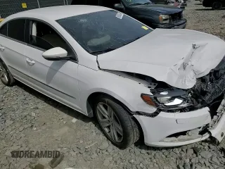 2014 Volkswagen CC Sport with VIN WVWBN7AN3EE528302, listed as a Copart auction lot 69636034 with 77,332 mi miles and Salvage Title. Bid and sale history available at DreamBid. Image 10.